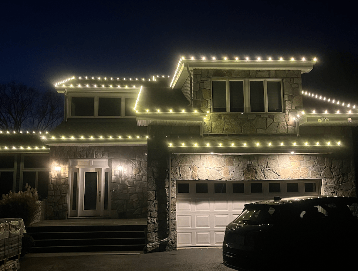 Christmas lights installed in a home near me.
