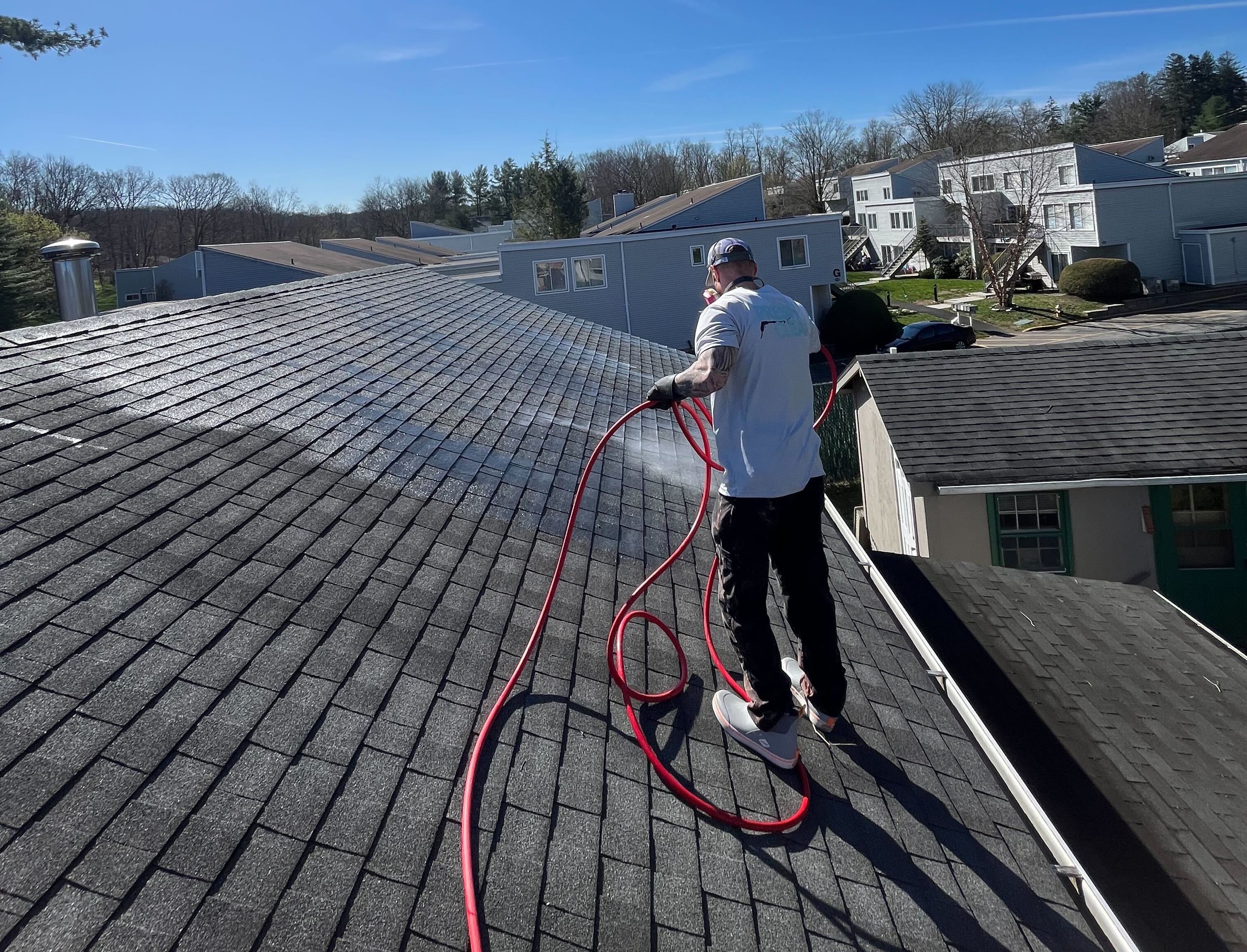 Roof being washed in Harrison, NY.